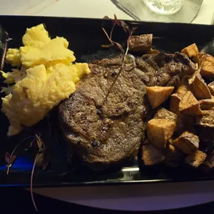New York Strip Steak- Potatoes- Eggs.