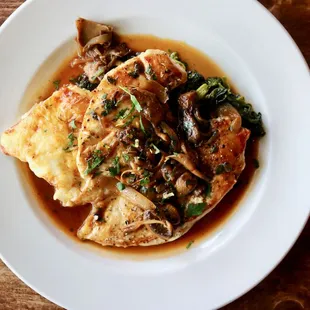 Grilled Mary's Chicken Breast with Potato Gratin, Garlicky Rabe, Mushroom Ragout, Rosemary Jus