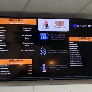 a menu on the wall of a restaurant