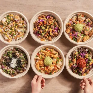 four bowls of different types of food