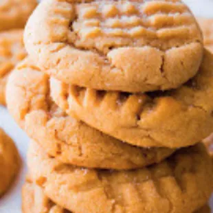 a stack of peanut butter cookies