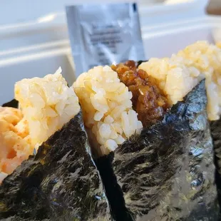 LOOK AT THEM- warm and freshly packed. Bacon, crab, unagi. Shiitake. Unagi is a must