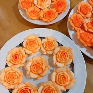 a plate of rose cookies