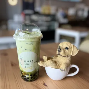 Mango matcha latte with chill puppy