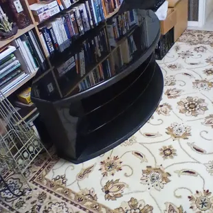 T V stand. Wood and glass.50" x27" x19" high.very good condition. Best offer takes it.