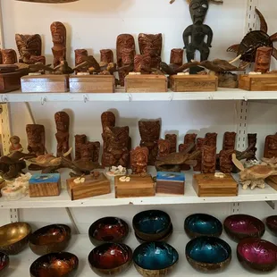 Wooden tiki statues &amp; bowls