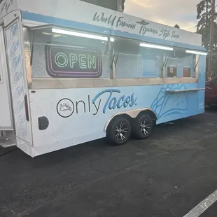 a food truck parked in a parking lot