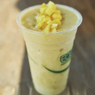 a smoothie in a plastic cup