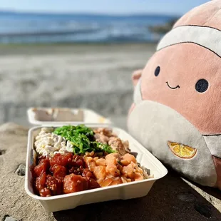 a bowl of food on the beach