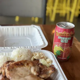 a container of chicken and rice