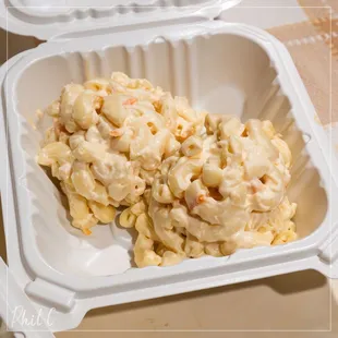 Two scoops of macaroni salad - take-out