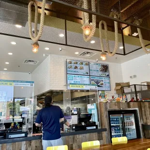 a man standing at the counter