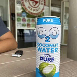 a can of coconut water on a table