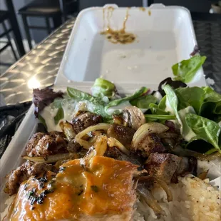 Salmon with steak mushrooms and onions with spinach salad.  OMG!  So much food and sooo Ono.