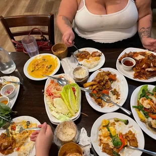 a table full of food and drinks