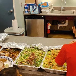 Fried chicken and pork Ono basil stir fry on the left