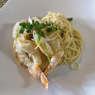 Shrimp and angel hair pasta in the most dreamy garlic butter sauce. To die for!