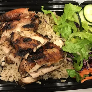 Chicken bowl, with side salad.