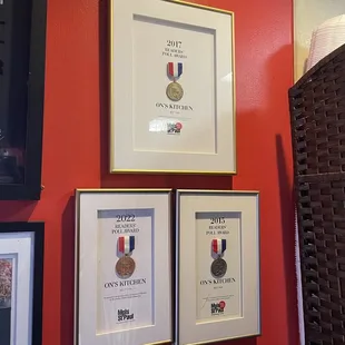a few framed medals