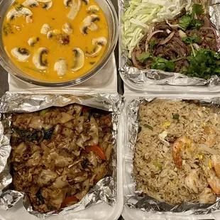 Tom kha kai, grilled beef salad, pad kee mow with pork, and fried rice