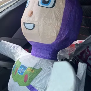 Funny buzz light year piñata.