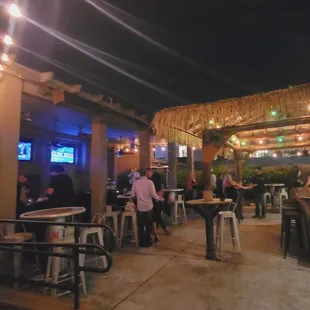 a group of people sitting at tables
