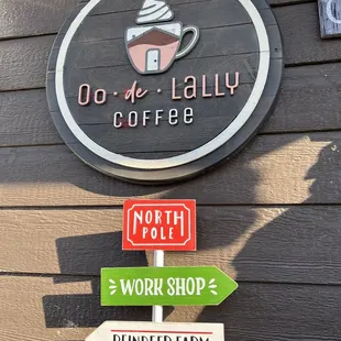 ows a sign for a coffee shop