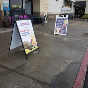 a sign on the sidewalk