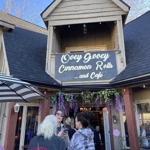 people outside a cafe