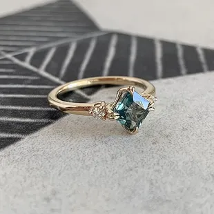 The Elain. A green sapphire 14k yellow custom engagement ring.