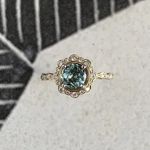 The Arwin! A green aquamarine in a romantic setting.