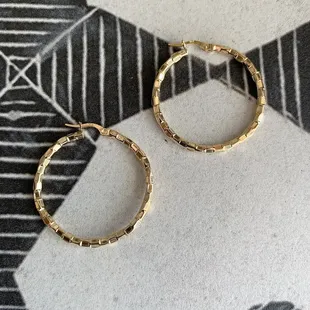Textured disco 14k yellow hoops.