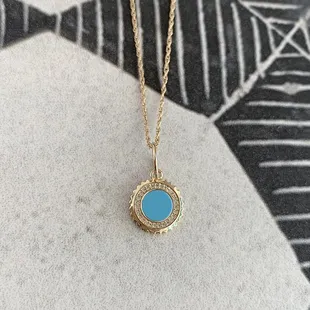 Turquoise enamel and diamond medallion 14k yellow necklace.