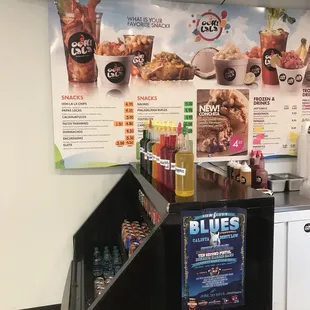 a counter with drinks and snacks