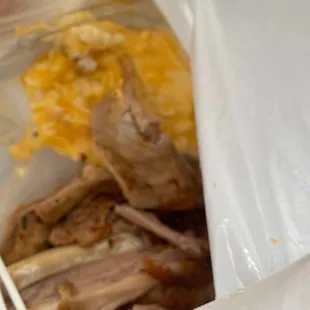 a plastic container filled with food