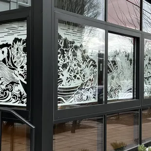 a large window with decorative glass