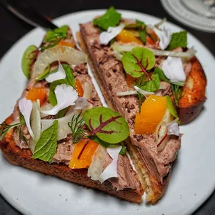 Chicken liver mousse on brioche with cocoa nibs