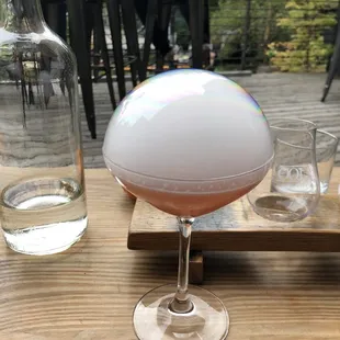 Earth cocktail with edible smoke bubble