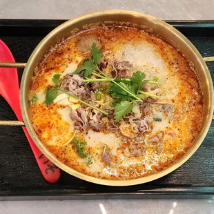 Beef pot, $15.95 during lunch hours on the weekday.