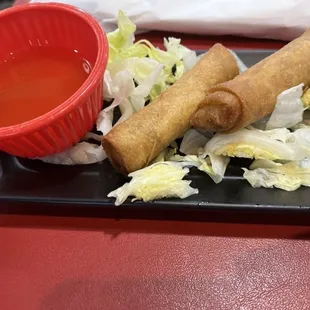 Fried spring rolls with fish sauce.