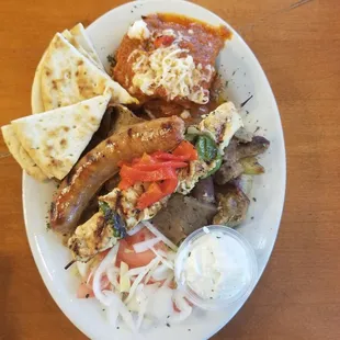 Mt Olympus platter (gyros, chicken skewer, sausage, greak pasta, pitas and roasted potatoes)
