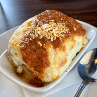 a piece of lasagna on a plate