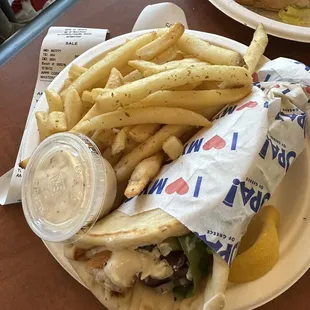 Pita meal. Comes with fresh lemon slice and tzatziki