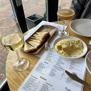 Hummus platter...with Chardonnay and Pear Martini. Great table overlooking outside.