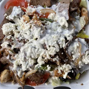 Mixed Grill over salad