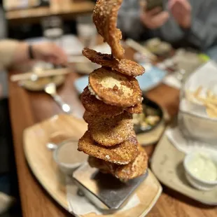a stack of fried food