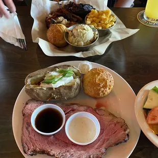 3 Meat Platter: Pulled pork, Beef Brisket, Ribs, Potato Salad &amp; Mac Cheese. I had the Prime Rib dinner Special.  Prime Rib, Baked Potato.