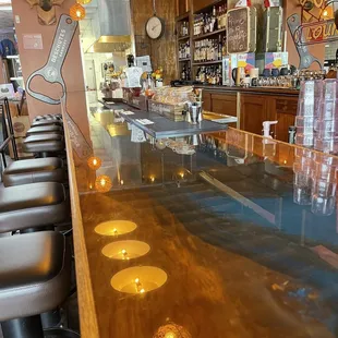 a long bar with stools