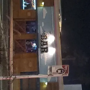 a view of the outside of a bar