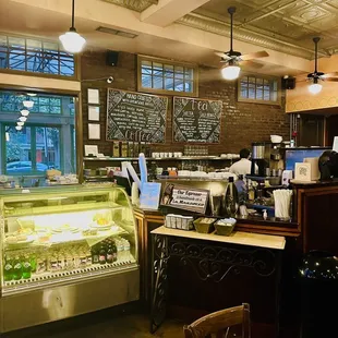 a restaurant with a counter and a bar